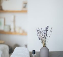 Calm treatment room with towel, essential oil and lavender